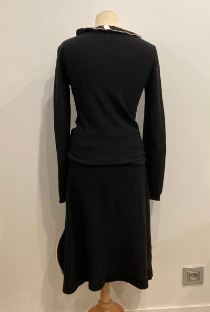 null SONIA RYKIEL. 

A set consisting of a black top and a black skirt with elastic...