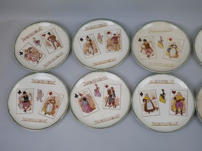 null CHOISY.

Set of nine fine earthenware plates with anecdotal decoration around...