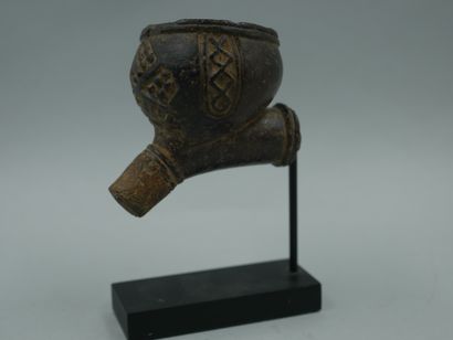 null DEMOCRATIC REPUBLIC OF THE CONGO. Stone pipe carved with the ancient royal sign...