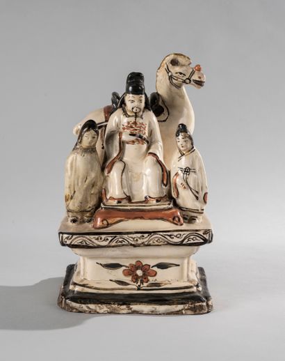 null CHINA, Ming dynasty (1368-1644), Cizhou kiln.

Group composed of a seated dignitary...