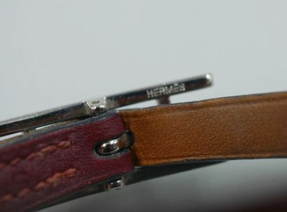 null HERMES Paris. 

Bracelet "Hapi" en cuir borderaux et métal argenté.

Signé....