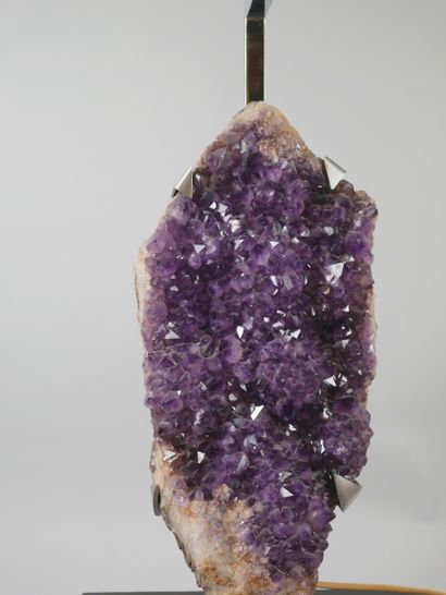 null An important Brazilian amethyst mounted as a lamp and electrified, consisting...