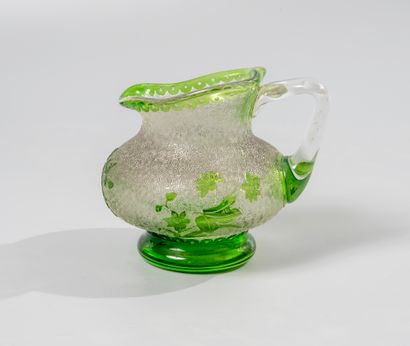 null BACCARAT. 

Small green frosted glass milk jug with scalloped rim and base decorated...