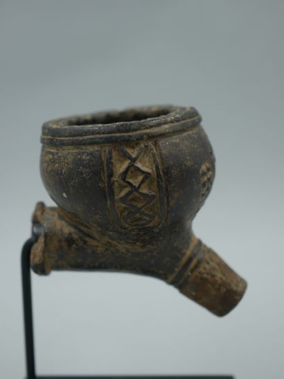 null DEMOCRATIC REPUBLIC OF THE CONGO. Stone pipe carved with the ancient royal sign...