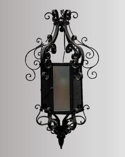null Multicolored glass and wrought iron cage chandelier with volutes. 

20th ce...