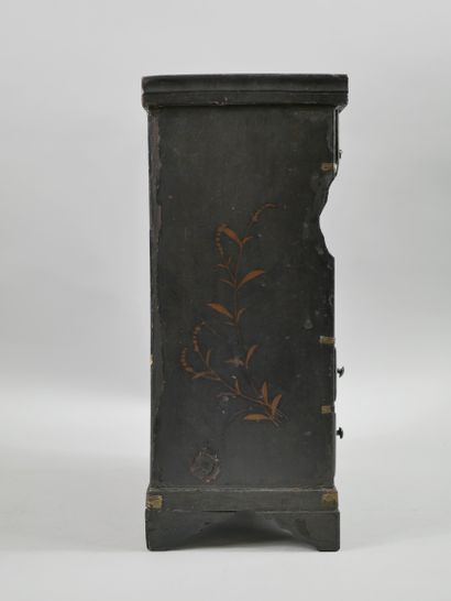 null CHINA.

A small painted wood cabinet with drawers, decorated with birds and...