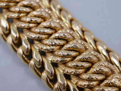 null 
18k yellow gold bracelet with interlaced mesh. Work of the 1960s. Weight :...