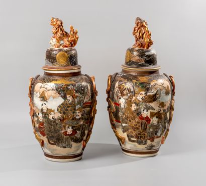 null SATSUMA. 

Pair of satsuma earthenware covered vases decorated with wise men...