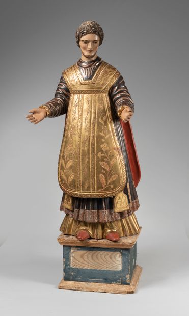 null Important polychrome and gilded wood sculpture representing a clergyman. The...