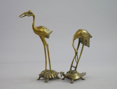 null Two bronze subjects representing a crane on the back of the celestial tortoise....