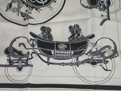 null HERMES Paris. 

Silk scarf with black carriages on white background. 

(Slightly...