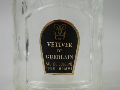 null GUERLAIN "Vetiver".

Glass bottle, label noted Vétiver de Guerlain, eau de Cologne...