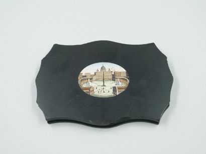 null A black marble paperweight with scalloped edges decorated with a micro-mosaic...