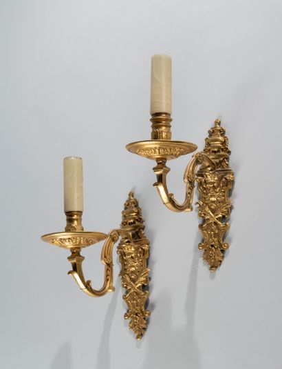 null A pair of ormolu sconces with one arm decorated with mascaron, fire pot and...