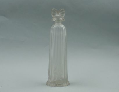 null Perfume bottle "Robe longue" in pressed moulded glass. Stopper with a knot pattern....