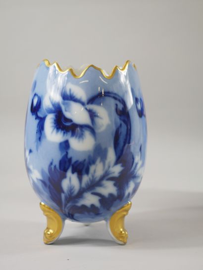 null Limoges porcelain egg vase with a blue background decorated with flowers. It...
