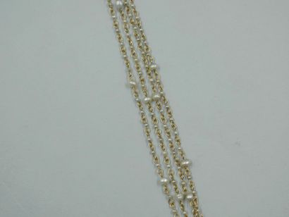null 18k yellow gold chain punctuated with baroque cultured pearls of various sizes....