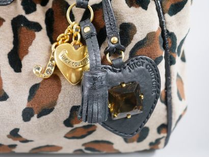 null JUICY COUTURE. 

Velvet handbag with leopard print and leather. Inside pocket....
