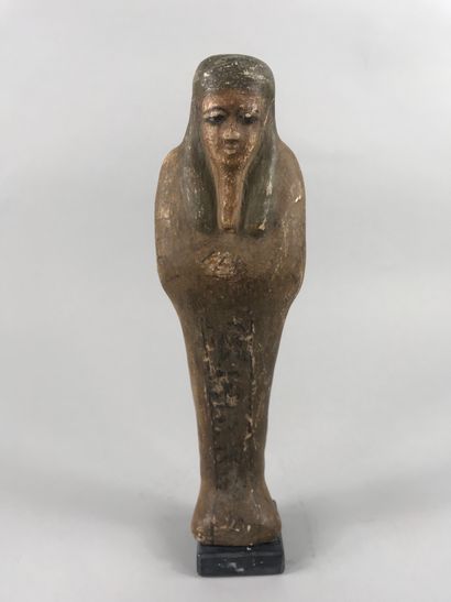 null Ptah Sokhar Osiris en bois sculpté polychrome.

Style ptolémaïque.

Haut. :23cm.

(En...