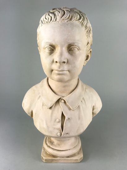 null L. GUSTIN (XIX-XXème siècle). Sculpture en plâtre representant un buste de jeune...