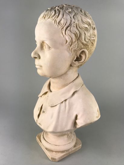 null L. GUSTIN (XIX-XXème siècle). Sculpture en plâtre representant un buste de jeune...