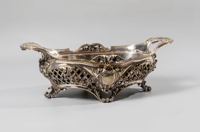 null Openwork planter in silvered bronze with four blind cartouches in a frame of...