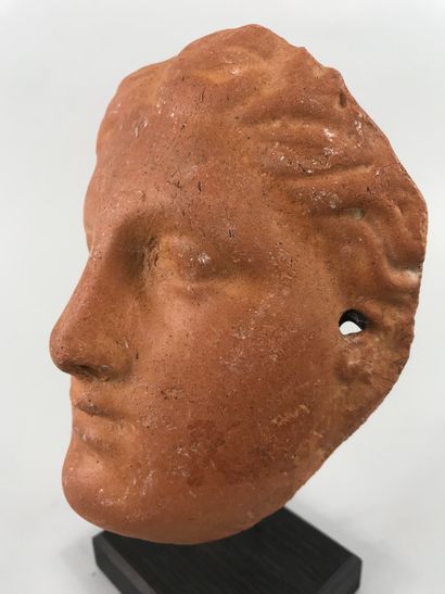 null Fine female face in terracotta probably votive.

Greco-Roman style.

Height....