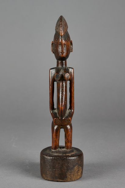 null CÔTE D'IVOIRE, Sénoufo. 

Figure d'ancêtre féminin en bois sculpté. Belle patine.

Haut....