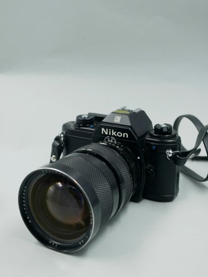 null Nikon EM camera, with its SOLIGOR Macro 3.5/105mm lens, Japan. In its minolta...