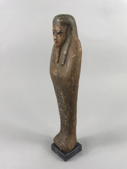 null Ptah Sokhar Osiris in polychrome carved wood.

Ptolemaic style.

Height. 23cm.

(In...