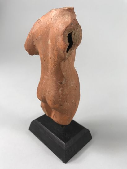 null Beautiful acephalous body of a female nude in terracotta.

Greek Hellenistic...