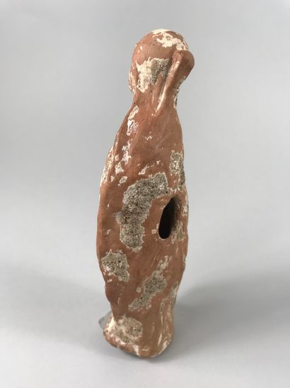 null Draped female statue in terracotta with engobe remains.

Greco-Roman period....
