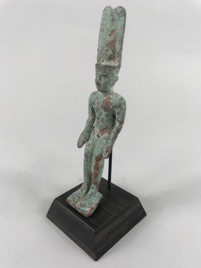 null God Osiris Moon seated in the form of a naked child crowned with the crown of...