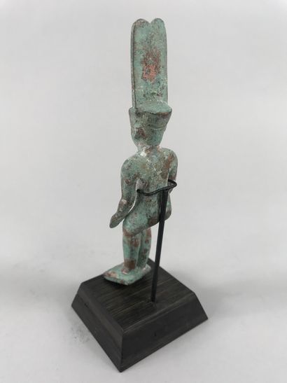 null God Osiris Moon seated in the form of a naked child crowned with the crown of...