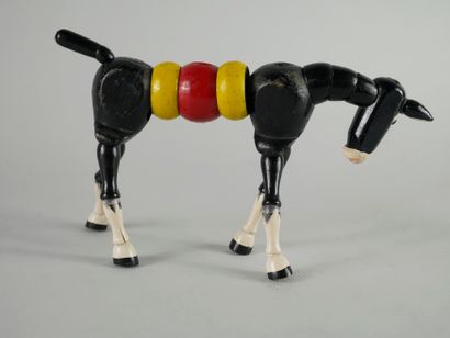 null Small articulated donkey in painted wood.