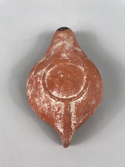 null Oil lamp in terracotta with a sigil decorated with the Chrism symbol of Christ.

Paleochristian...