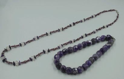 null Two necklaces of faceted amethyst beads.