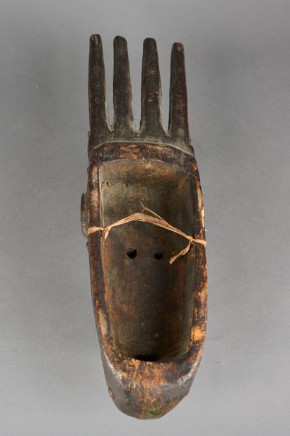 null MALI, Bambara. 

Mask in carved wood and metal.

Height: 44 cm. 

(In the s...