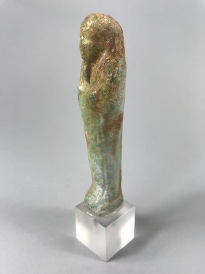 null Inscribed oushebti of a dignitary.in turquoise frit, as is. 

Ptolemaic period....