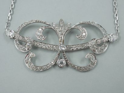 null Necklace with openwork platinum flower scrolls, paved with diamonds and flanked...