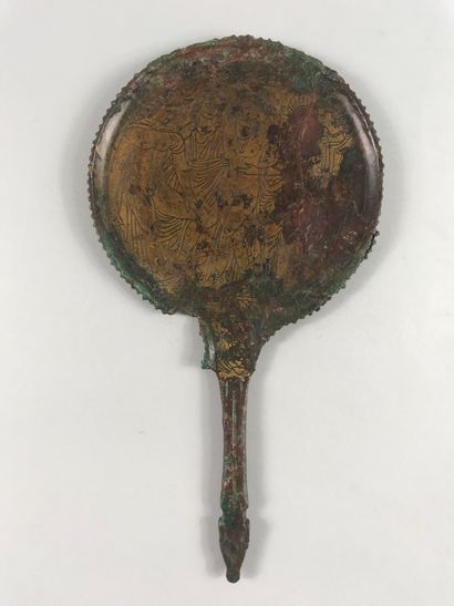 null Italy, Etruscan workshop 

Mirror with a tongue ending in a ram's head 

The...