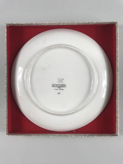 null 
CARTIER and L. BERNARDAUD and Co. in Limoges. 
Three porcelain dinner plates,...