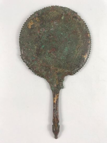 null Italy, Etruscan workshop 

Mirror with a tongue ending in a ram's head 

The...