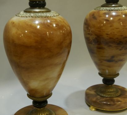 null Pair of baluster lamp feet on pedestal in brown onyx moiré and speckled with...