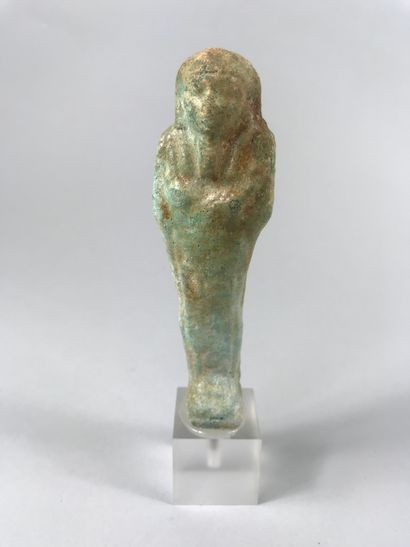 null Inscribed oushebti of a dignitary.in turquoise frit, as is. 

Ptolemaic period....