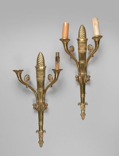 Pair of bronze sconces with two arms of light.

Louis...
