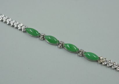 null Bracelet in 14k white gold decorated with four cabochon of jade and diamonds....
