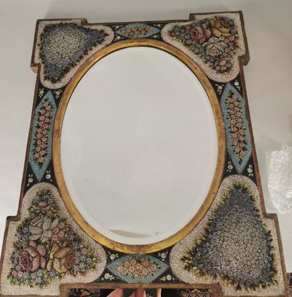 null Portable oval mirror in a gilded wood frame decorated with a millefiori micro-mosaic...