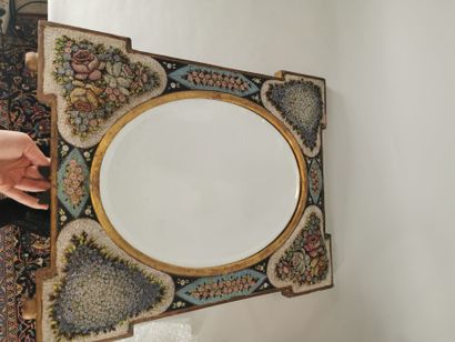 null Portable oval mirror in a gilded wood frame decorated with a millefiori micro-mosaic...