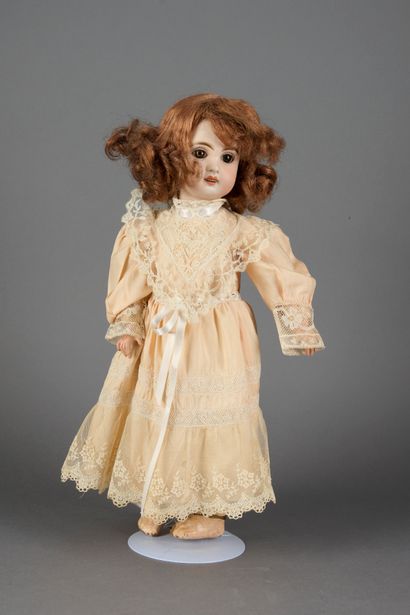 null French doll with bisque head, open mouth, fixed brown eyes. 

Not marked. 

SFBJ...